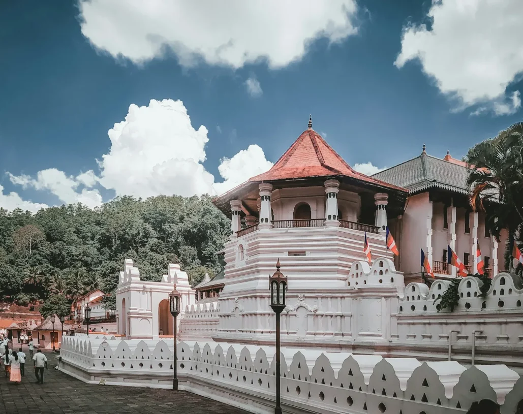 a large white building with a red roof